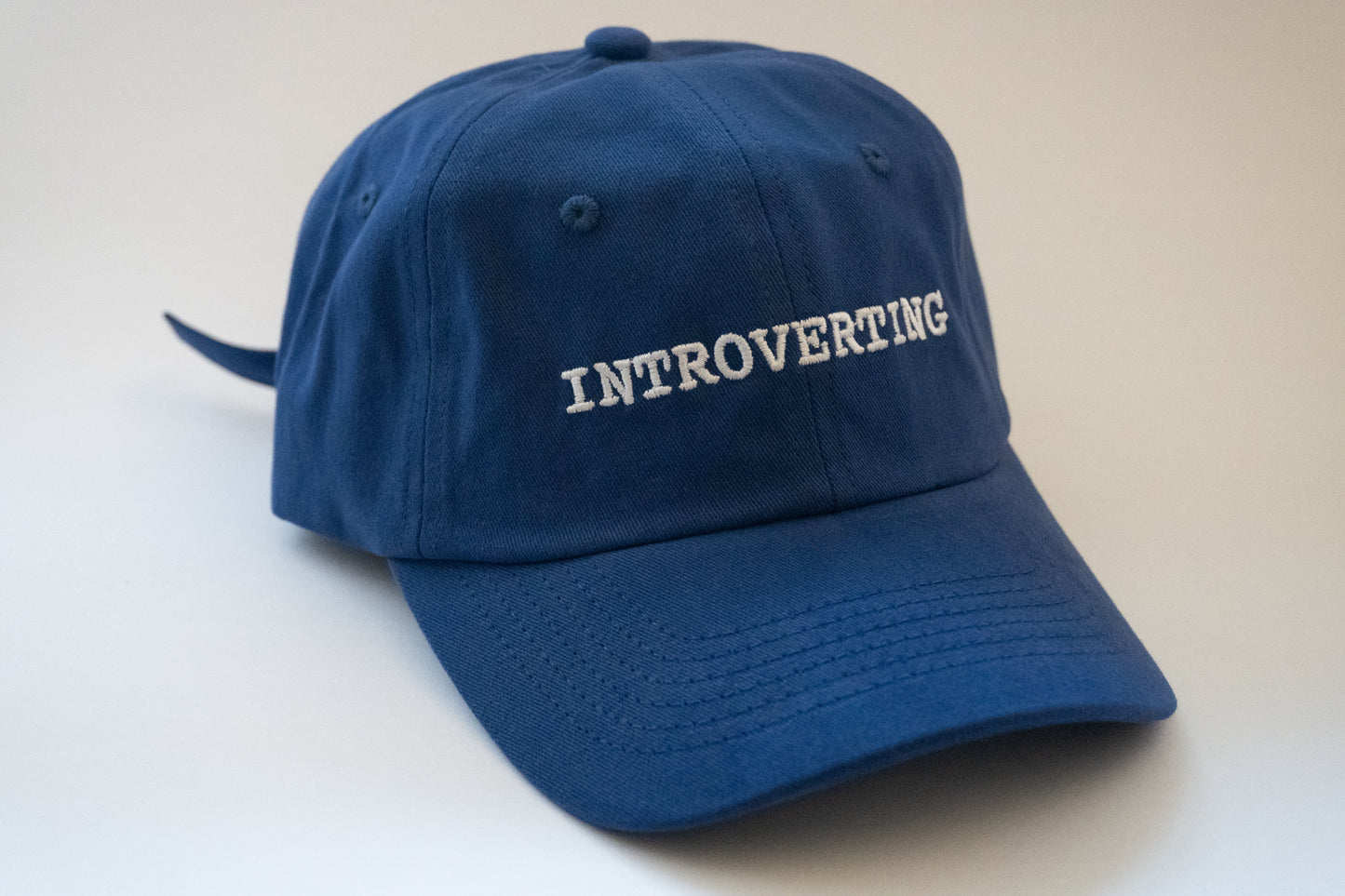 Introverting Cap